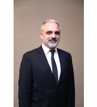 M. Gökmen AYDINLI